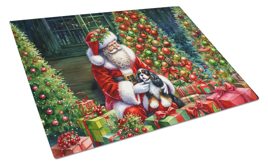 Buy this Cavalier Spaniel and Santa Claus Glass Cutting Board