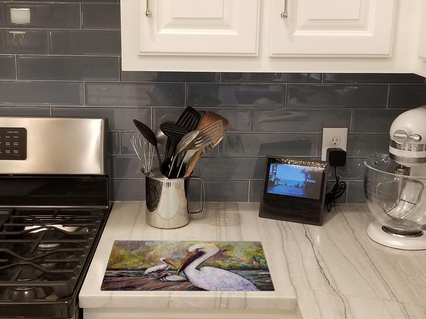 Three Pelicans on a Pier Glass Cutting Board